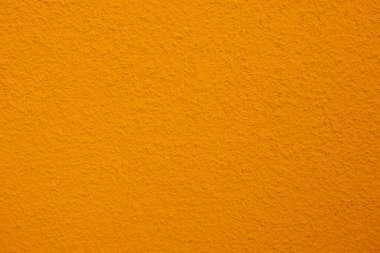 Seamless texture of yellow cement old wall a rough surface, with space for text, for a background.	