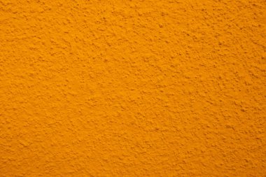 Seamless texture of yellow cement old wall a rough surface, with space for text, for a background.	