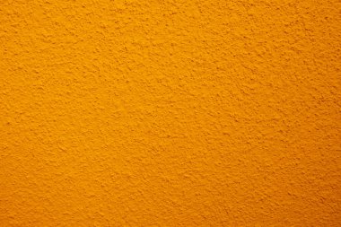 Seamless texture of yellow cement old wall a rough surface, with space for text, for a background.	