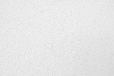 Beyaz beton duvarın pürüzsüz dokusu kaba bir yüzey, metin için boşluk, arkaplan için alan.