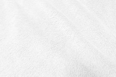 White clean wool texture background. light natural sheep wool. white seamless cotton. texture of fluffy fur for designers. close-up fragment white wool carpet.	