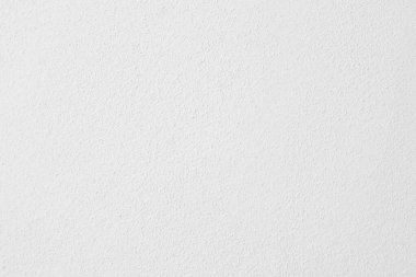 Seamless texture of white cement wall a rough surface, with space for text, for a background.	