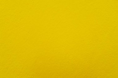 Seamless texture of yellow cement old wall a rough surface, with space for text, for a background.	