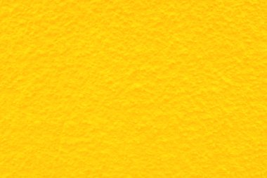 Seamless texture of yellow cement old wall a rough surface, with space for text, for a background.	