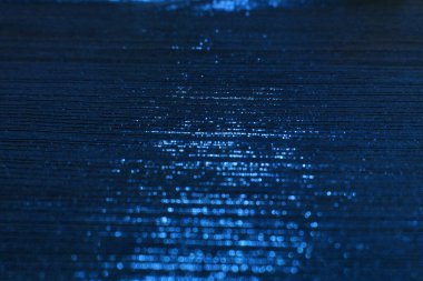 Dark blue velvet fabric texture used as background. Empty dark blue fabric background of soft and smooth textile material. There is space for text.	
