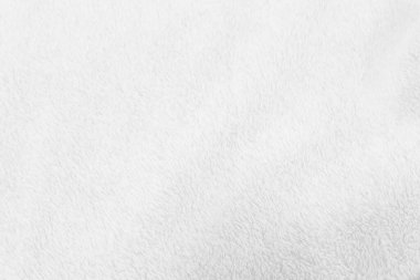 Beyaz, temiz yün dokusu arka planda. hafif doğal koyun yünü. Beyaz, pürüzsüz pamuk. Tasarımcılar için tüylü kürk dokusu. yakın plan beyaz yün halı.