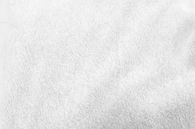 Beyaz, temiz yün dokusu arka planda. hafif doğal koyun yünü. Beyaz, pürüzsüz pamuk. Tasarımcılar için tüylü kürk dokusu. yakın plan beyaz yün halı.
