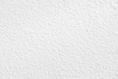 Beyaz beton duvarın pürüzsüz dokusu kaba bir yüzey, metin için boşluk, arkaplan için alan.