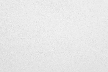 Beyaz beton duvarın pürüzsüz dokusu kaba bir yüzey, metin için boşluk, arkaplan için alan.