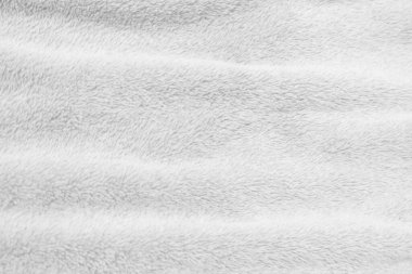 White clean wool texture background. light natural sheep wool. white seamless cotton. texture of fluffy fur for designers. close-up fragment white wool carpet.	