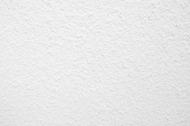 Beyaz beton duvarın pürüzsüz dokusu kaba bir yüzey, metin için boşluk, arkaplan için alan.