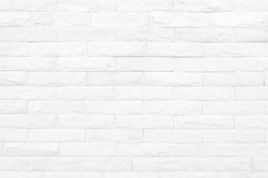 Seamless texture of white brick cement wall a rough surface, with space for text, for a background..	