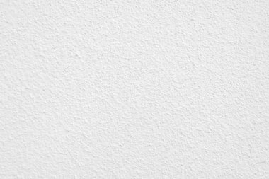 Seamless texture of white cement wall a rough surface, with space for text, for a background..	