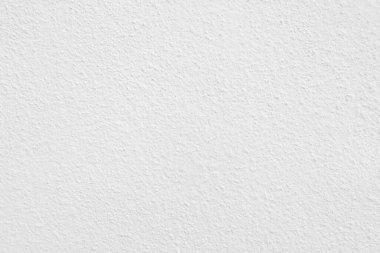 Seamless texture of white cement wall a rough surface, with space for text, for a background..	