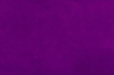 The texture of the old purple fabric has a vintage dullness, there is a text area for the background, used for vintage wallpapers and designs.	