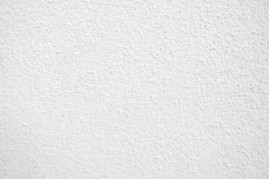 Beyaz beton duvarın pürüzsüz dokusu kaba bir yüzey, metin için boşluk, arkaplan için alan.