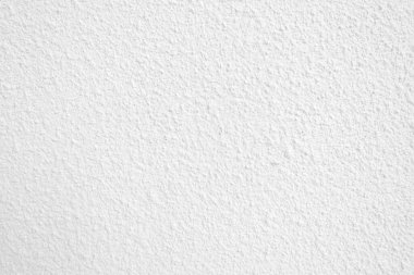 Beyaz beton duvarın pürüzsüz dokusu kaba bir yüzey, metin için boşluk, arkaplan için alan.