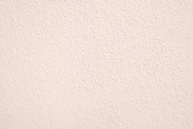 Seamless texture of pacific pink cement wall a rough surface, with space for text, for a background..	