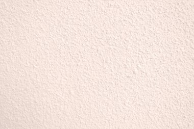 Seamless texture of pacific pink cement wall a rough surface, with space for text, for a background..	
