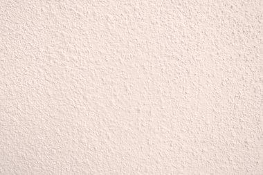Seamless texture of pacific pink cement wall a rough surface, with space for text, for a background..	