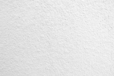 Seamless texture of white cement wall a rough surface, with space for text, for a background..	