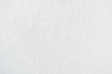 Seamless texture of white cement wall a rough surface, with space for text, for a background..	