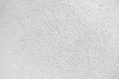 Seamless texture of white cement wall a rough surface, with space for text, for a background..	