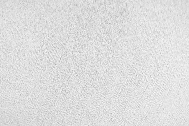 Seamless texture of white cement wall a rough surface, with space for text, for a background...	