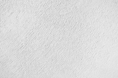 Seamless texture of white cement wall a rough surface, with space for text, for a background...	
