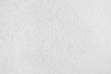 Seamless texture of white cement wall a rough surface, with space for text, for a background...	