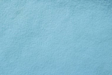 Felt pastel blue soft rough textile material background texture close up,poker table,tennis ball,table cloth. Empty white fabric background..	