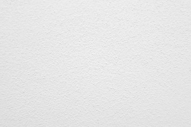 Beyaz beton duvarın pürüzsüz dokusu kaba bir yüzey, metin için boşluk, arkaplan için alan.