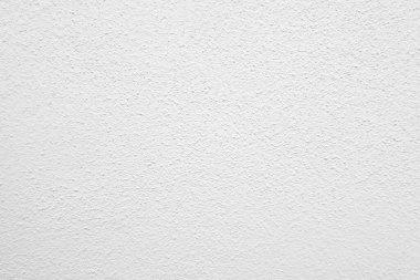 Beyaz beton duvarın pürüzsüz dokusu kaba bir yüzey, metin için boşluk, arkaplan için alan.