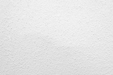 Beyaz beton duvarın pürüzsüz dokusu kaba bir yüzey, metin için boşluk, arkaplan için alan.