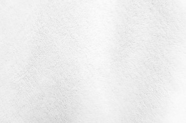White clean wool texture background. light natural sheep wool. white seamless cotton. texture of fluffy fur for designers. close-up fragment white wool carpet.	