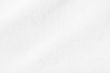 White clean wool texture background. light natural sheep wool. white seamless cotton. texture of fluffy fur for designers. close-up fragment white wool carpet..	