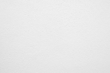 Beyaz beton duvarın pürüzsüz dokusu kaba bir yüzey, metin için boşluk, arkaplan için alan.