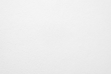 Seamless texture of white cement wall a rough surface, with space for text, for a background..	