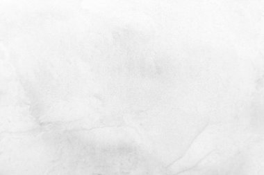 Beyaz taş dokusunun yüzeyi pürüzlü, gri-beyaz tonda. Duvar kağıdı veya arkaplan resmi için bunu kullanın. Metin için boş bir boşluk var