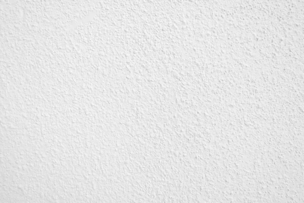 Beyaz beton duvarın pürüzsüz dokusu kaba bir yüzey, metin için boşluk, arkaplan için alan.