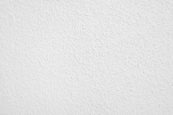 Beyaz beton duvarın pürüzsüz dokusu kaba bir yüzey, metin için boşluk, arkaplan için alan.
