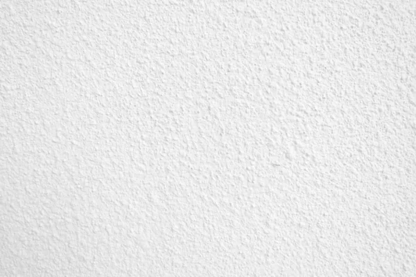 Beyaz beton duvarın pürüzsüz dokusu kaba bir yüzey, metin için boşluk, arkaplan için alan.