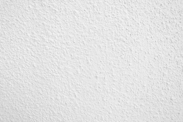 Beyaz beton duvarın pürüzsüz dokusu kaba bir yüzey, metin için boşluk, arkaplan için alan.