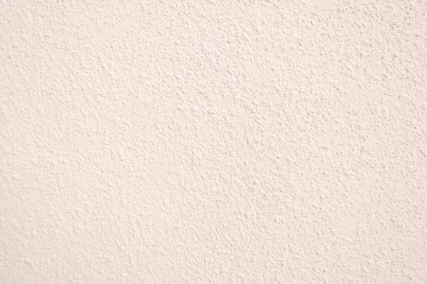 Seamless texture of pacific pink cement wall a rough surface, with space for text, for a background..	