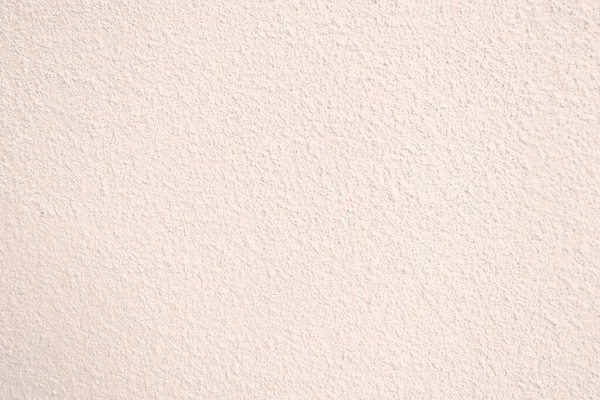 Seamless texture of pacific pink cement wall a rough surface, with space for text, for a background..	