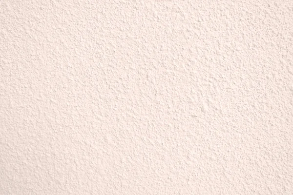 Seamless texture of pacific pink cement wall a rough surface, with space for text, for a background..	