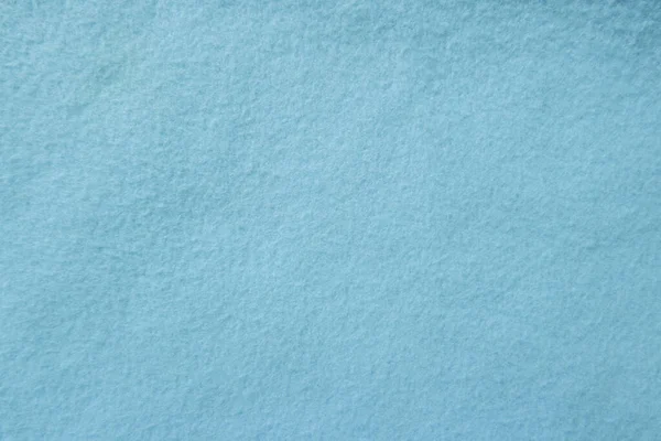 Felt pastel blue soft rough textile material background texture close up,poker table,tennis ball,table cloth. Empty white fabric background..	