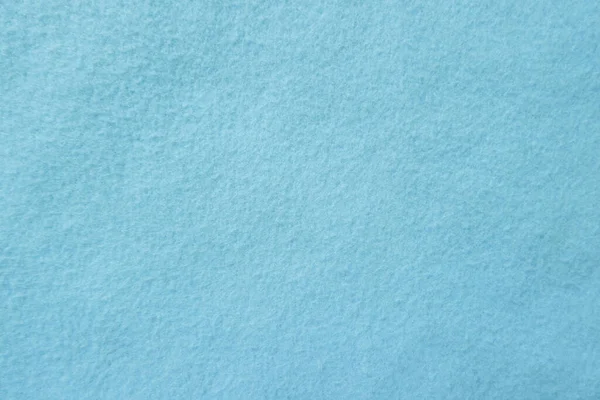 Felt pastel blue soft rough textile material background texture close up,poker table,tennis ball,table cloth. Empty white fabric background..	