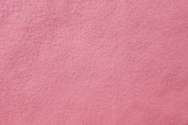 Felt pastel pacific pink soft rough textile material background texture close up,poker table,tennis ball,table cloth. Empty pink fabric background..	