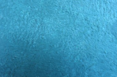 Seamless texture of blue cement old wall a rough surface, with space for text, for a background.	